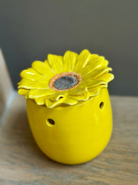 Zonnebloem waxbrander